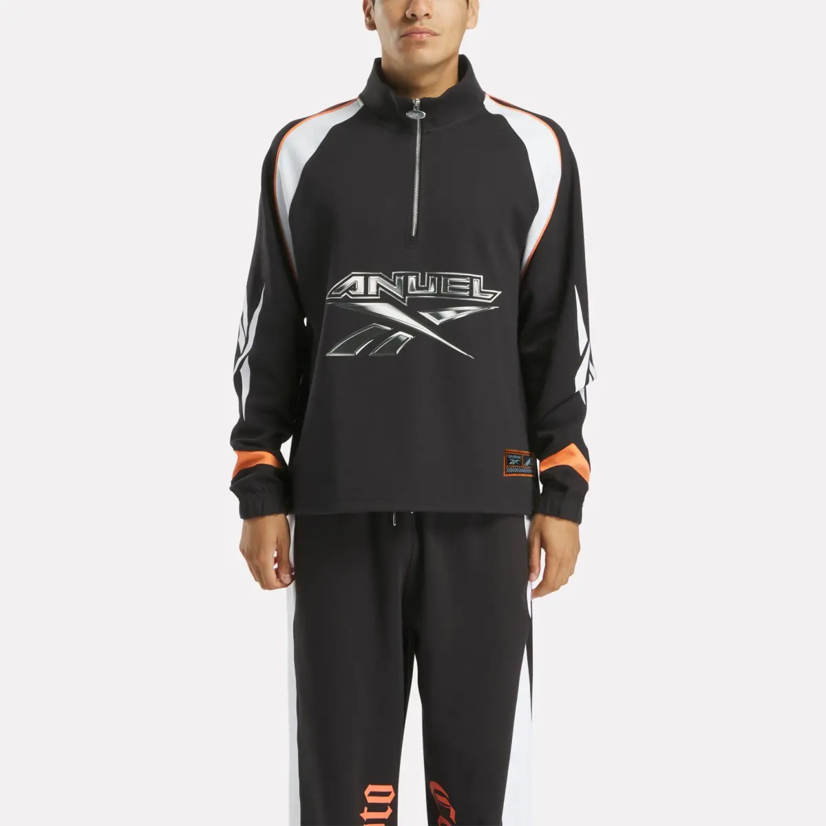 Haut à fermeture éclair 1/4 Reebok x Anuel AA