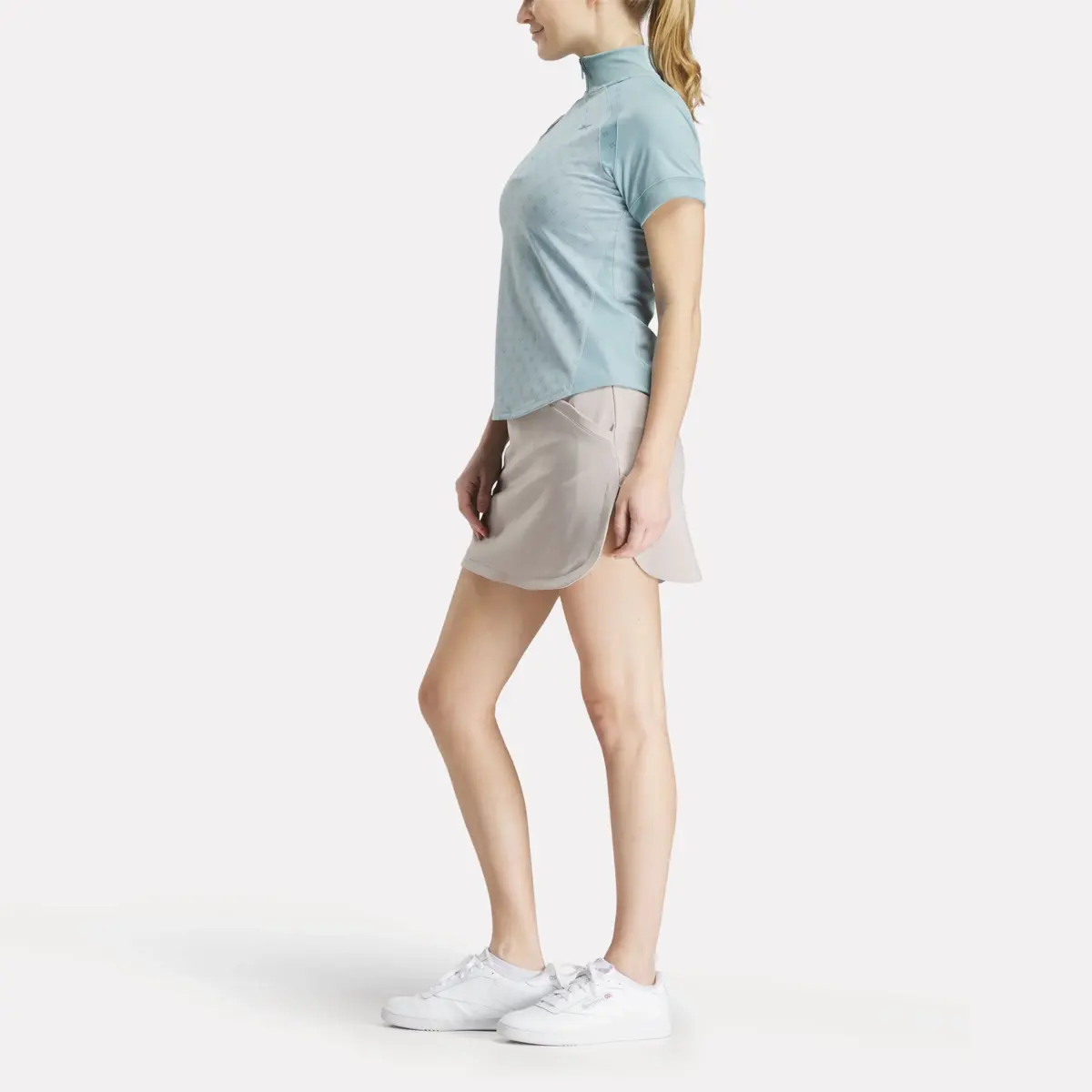 Haut à manches courtes et fermeture éclair 1/4 avec imprimé mini argyle pour femmes