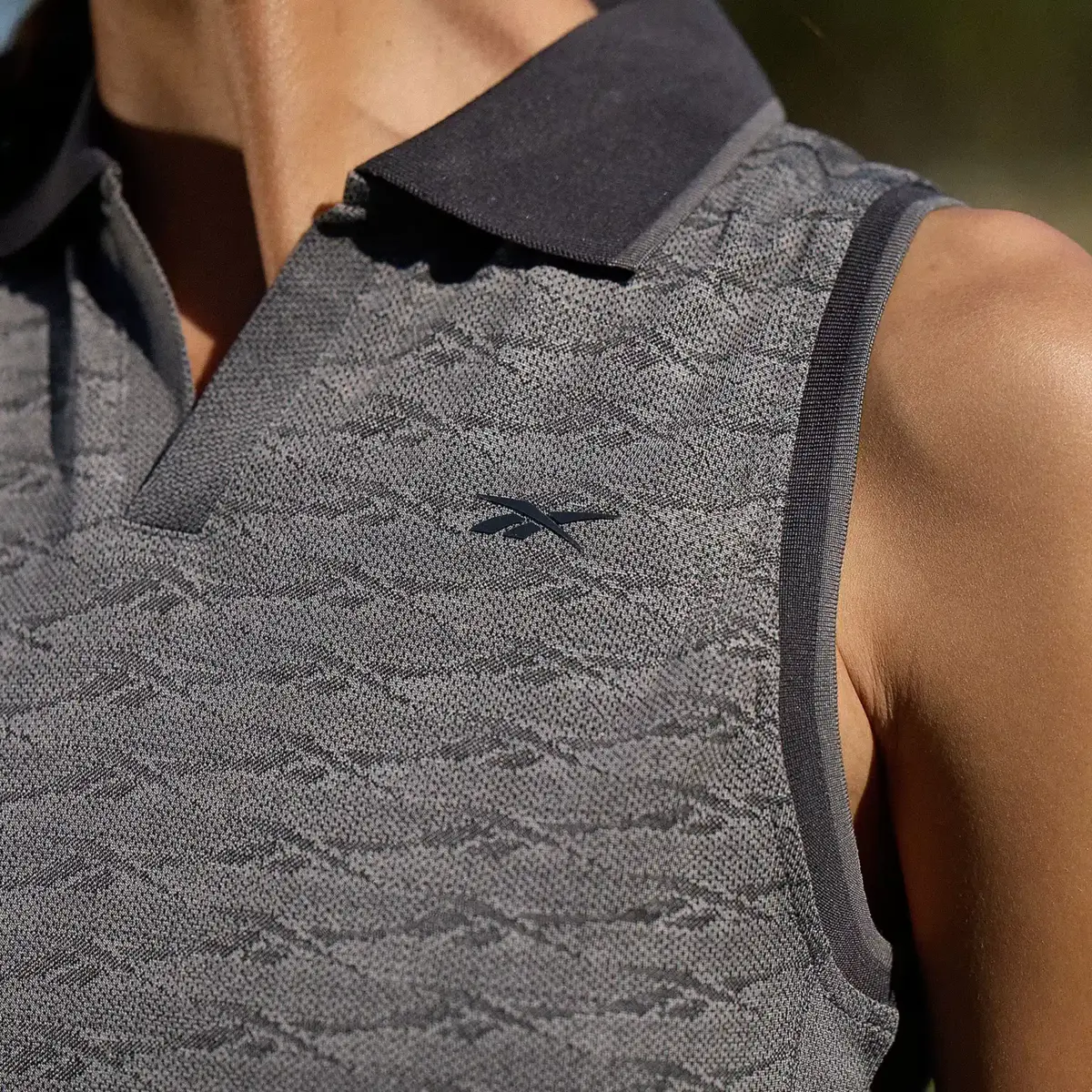 Polo de golf sans manches Vector Jacquard pour femme